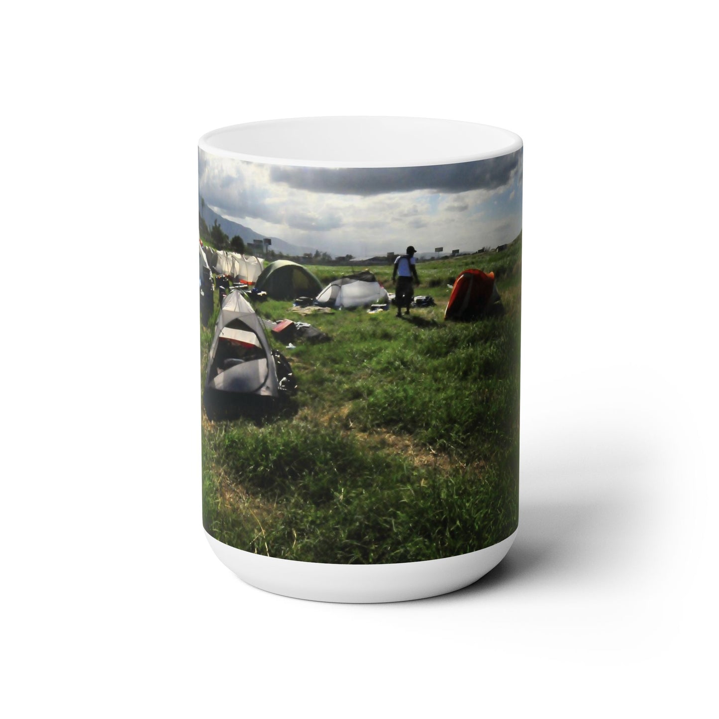 Elegant 15oz Ceramic Coffee Mug printed with beautiful image of camp tents in a open field.